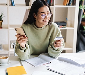 Woman holding a credit card